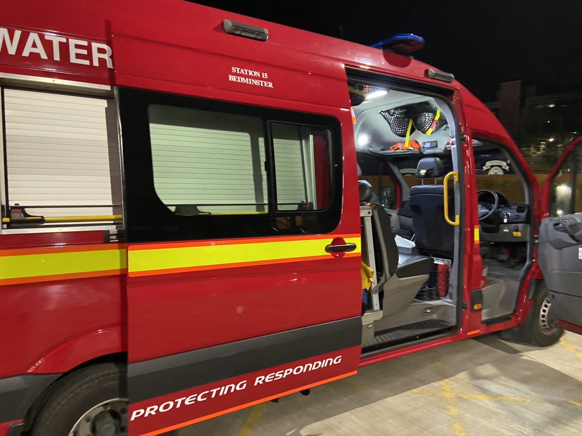 a red ambulance with open doors